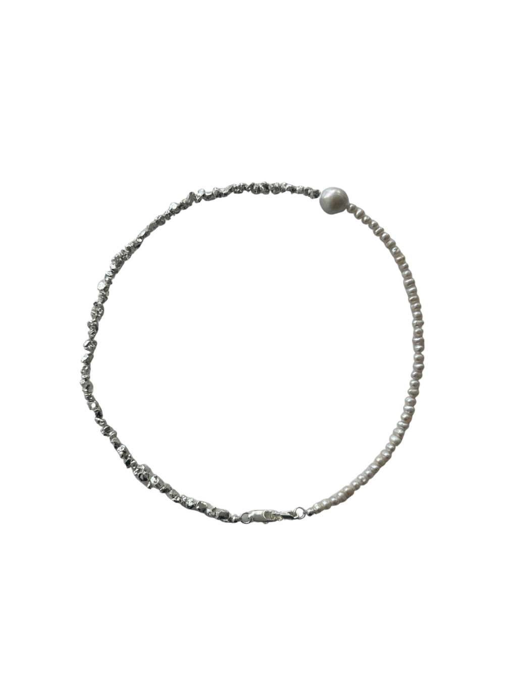 Necklace with small pearls on a white background