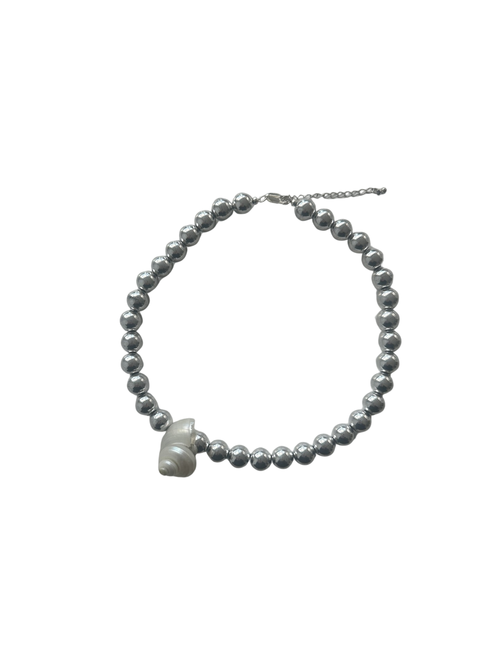 Pearl necklace with a heart-shaped pendant on a white background